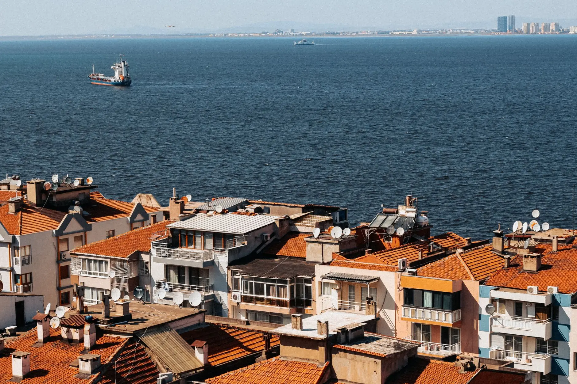 Cargo ship navigating Eastern Mediterranean waters near Turkish port facilities