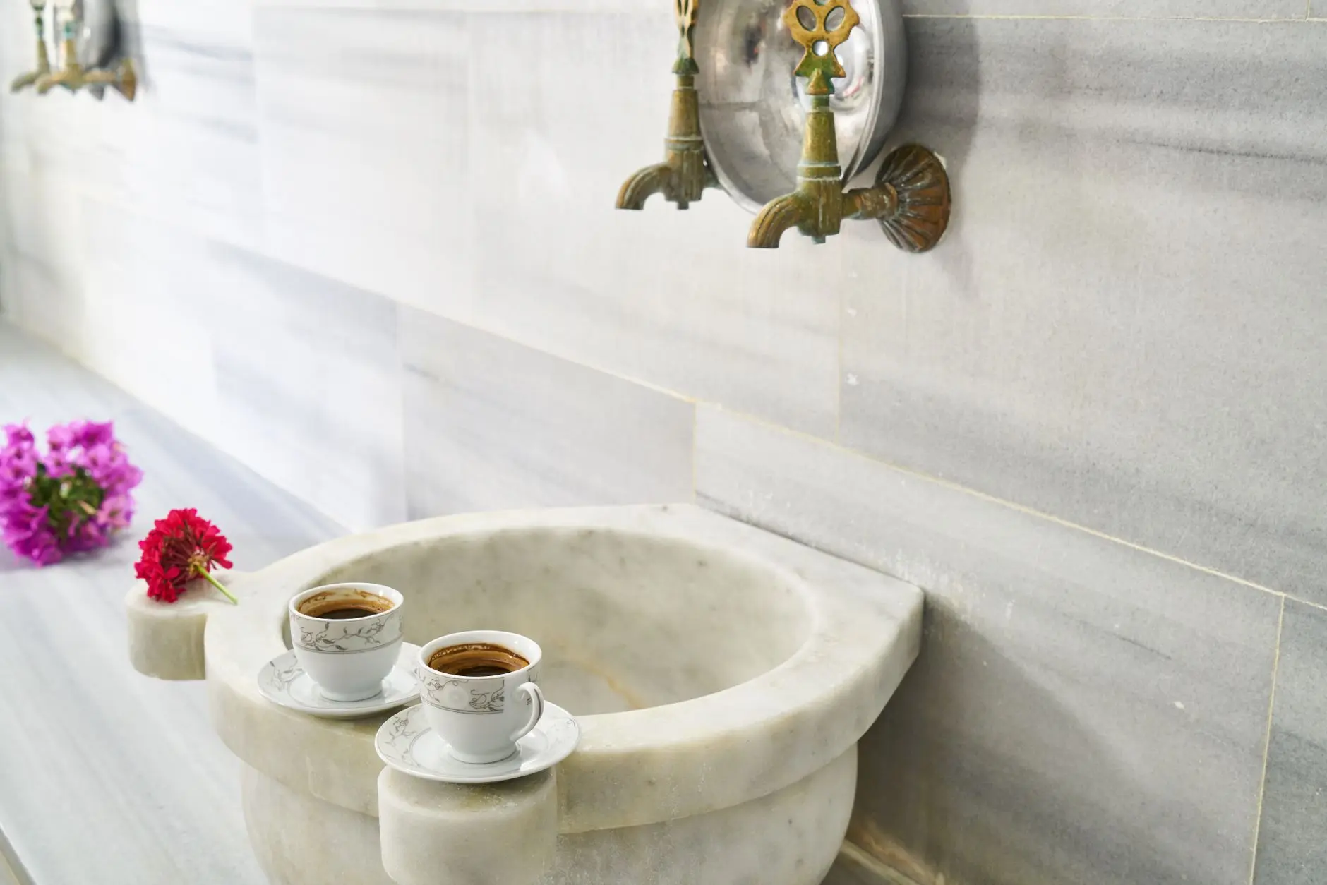 Decorative Turkish ceramic tiles displaying modern architectural patterns in a workshop