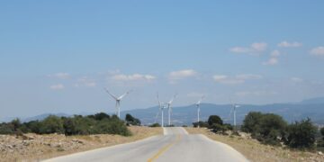 Wind turbines and clean power infrastructure supporting Turkey green energy strategy and electrification goals.