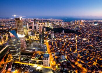 Modern commercial real estate buildings representing real estate investment in Turkey.