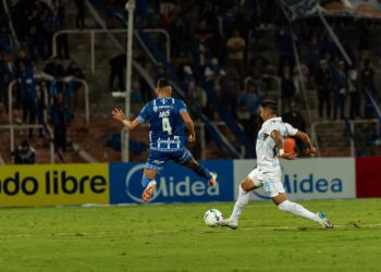 Action from a high-stakes UEFA Nations League international football match under stadium lights.