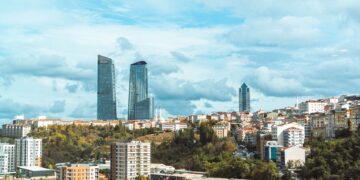 Modern architectural developments and real estate buildings representing the Turkish real estate market landscape.